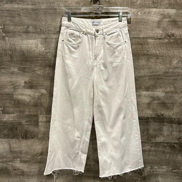 Zara Denim - Zara Pre Loved in great condition Wide Legs Jeans. Raw ends in white. Size 00